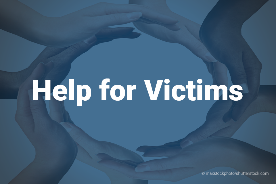 A circle formed by eight hands. Text on the image reads "Help for Victims"