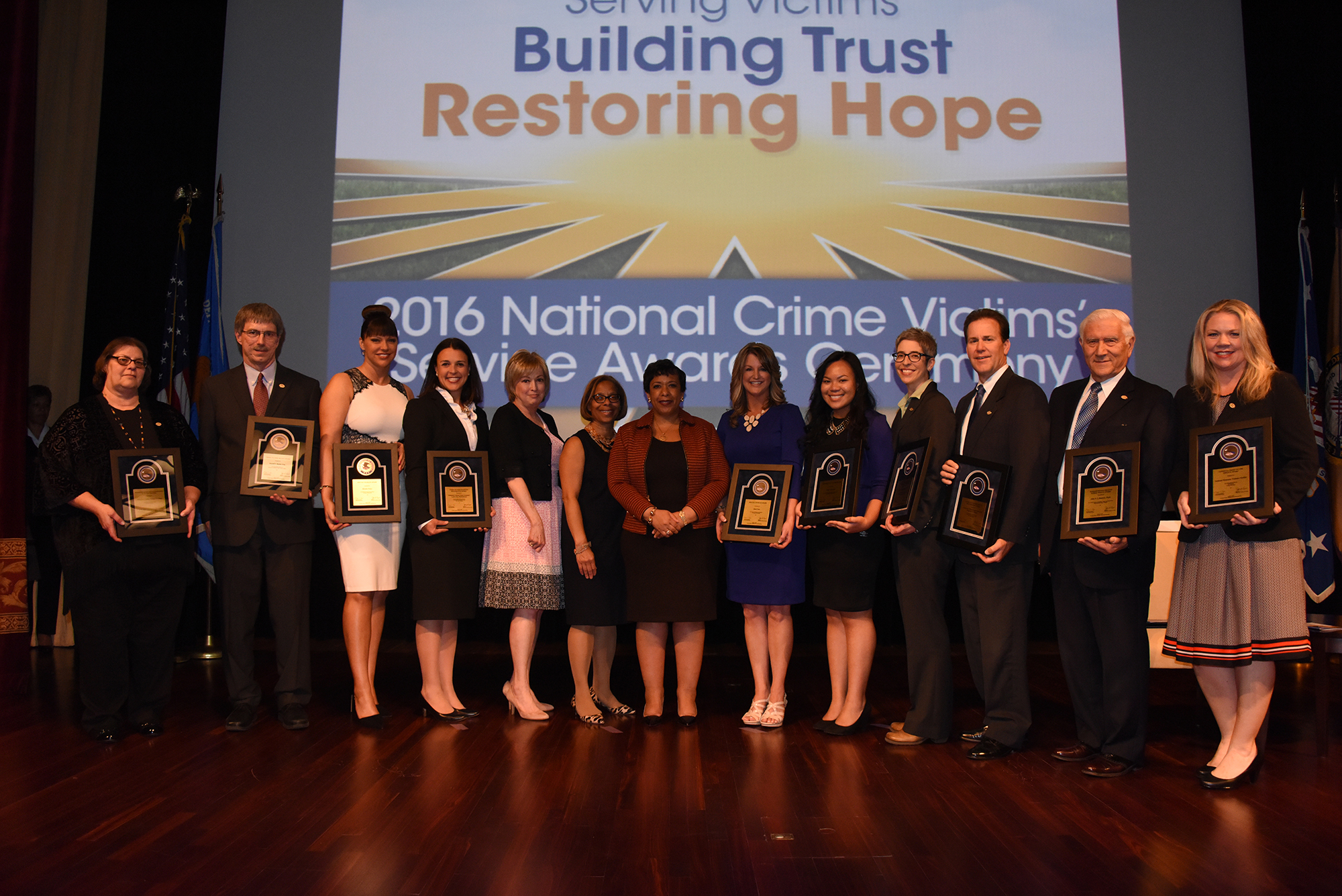 The 2016 National Crime Victims' Service Awards recipients with Joye E. Frost, Director, Office for Victims of Crime; Karol V. Mason, Assistant Attorney General; and Attorney General Loretta E. Lynch.